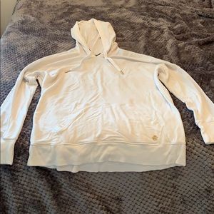 White active sweatshirt, slightly oversized
